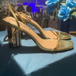 These sandals or an eye catcher with Mirror heels